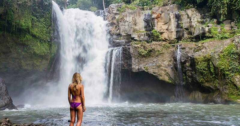Walk down to Tegenungan Waterfall river side and spend your time here